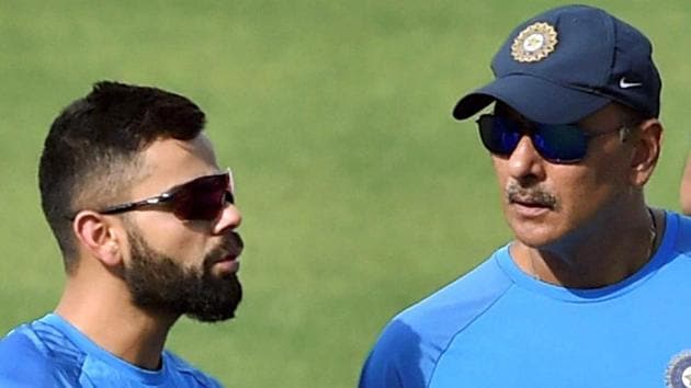 Virat Kohli chats with Ravi Shastri during a training session at the Eden Gardens in Kolkata ahead of the first cricket Test between India and Sri Lanka.(PTI)