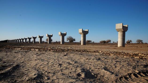 A portion of an unfinished railway project is seen in Khanbogd Soum in Mongolia. Miners say the long-term solution is a new rail link connecting mines with the Gashuun Sukhait crossing. Mongolia built more than 200 kilometres of foundations for railway tracks for the link but the project was put on hold after finances ran dry. (B. Rentsendorj / Reuters)
