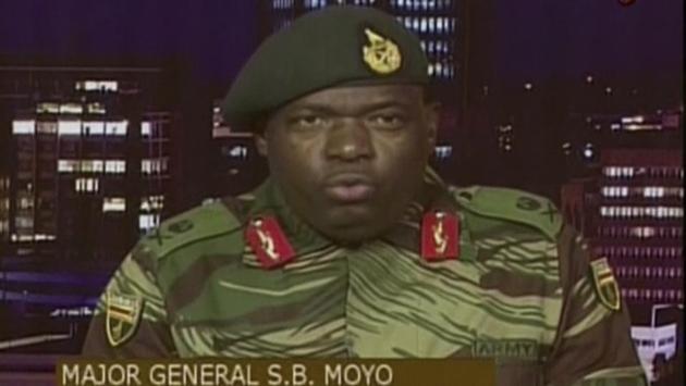 The army said in a statement after taking over the state broadcaster that it was not a coup, with Major General Sibusiso Moyo denying targeting the 93-year-old Mugabe. “It is not a military takeover of government,” Moyo said, adding: “We wish to assure the nation that his excellency the president... and his family are safe and sound and their security is guaranteed.” (ZBC via AP) 