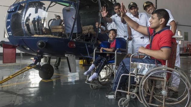 Physically abled children take a tour at the Indian Naval Ship (INS) Shikra, Mumbai through a guided tour by officers and crew members of Indian Navy. (Pratik Chorge/ HT Photo) Physically abled children take a tour at the Indian Naval Ship (INS) Shikra, Mumbai through a guided tour by officers and crew members of Indian Navy. (Pratik Chorge/ HT Photo)