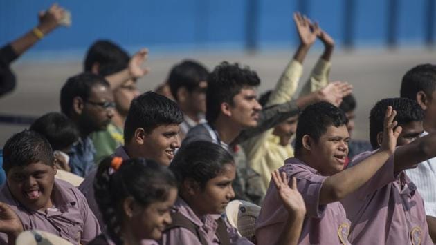 Students participating in the event wave during the air show organised by Indian Navy in Mumbai. The children got the opportunity to learn about the different types of naval helicopters and witnessed routine flying operations from the heliport . (Pratik Chorge/ HT Photo) Students participating in the event wave during the air show organised by Indian Navy in Mumbai. The children got the opportunity to learn about the different types of naval helicopters and witnessed routine flying operations from the heliport . (Pratik Chorge/ HT Photo)