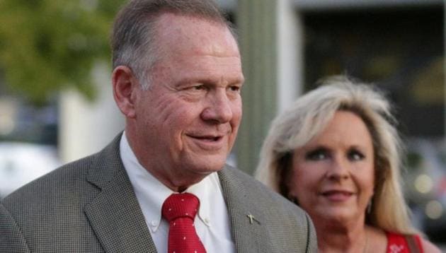 Republican candidate Roy Moore along with his wife Kayla arrive during the runoff election for the Republican nomination for Alabama's US Senate seat vacated by Attorney General Jeff Sessions,in Montgomery, Alabama, September 26, 2017. (Reuters File Photo) Republican candidate Roy Moore along with his wife Kayla arrive during the runoff election for the Republican nomination for Alabama's US Senate seat vacated by Attorney General Jeff Sessions,in Montgomery, Alabama, September 26, 2017. (Reuters File Photo)
