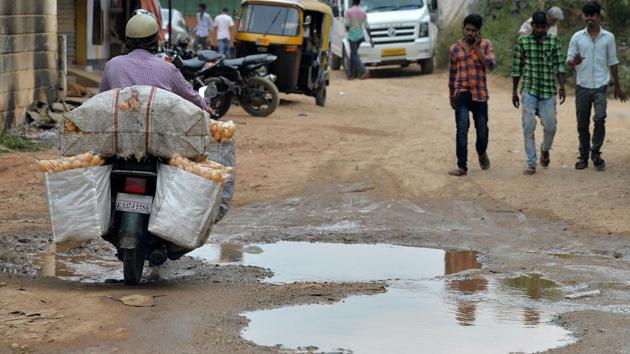 Doctors have reported a spike in patients arriving at Bangalore’s hospitals with back complaints and spinal injuries sustained on the city’s scarred roads. (Manjunath Kiran / AFP)