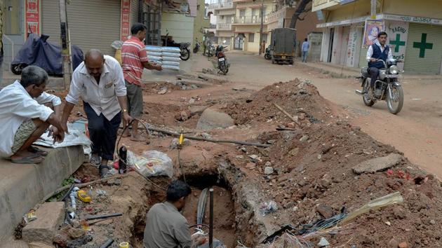Nearly 500 people have died so far this year navigating Bangalore’s pockmarked roads, making it the fourth-deadliest city in India for motorists. (Manjunath Kiran / AFP)