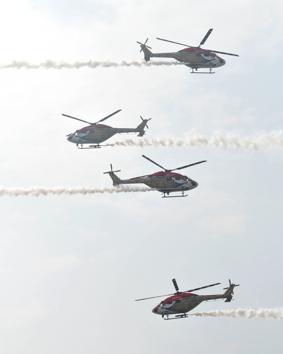 Sarang helicopters during aerobatic display at Adampur air force station near Jalandhar. (Pardeep Pandit/ht) 