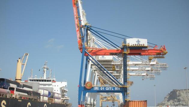 In this photograph taken on October 4, 2017, Pakistani naval personnel stand guard near a ship carrying containers at Gwadar Port. Remote and impoverished, Pakistan's Gwadar port at first glance seems an unlikely crown jewel in a multi-billion dollar development project. with China aiming at constructing a 21st century Silk Road. (AFP) In this photograph taken on October 4, 2017, Pakistani naval personnel stand guard near a ship carrying containers at Gwadar Port. Remote and impoverished, Pakistan's Gwadar port at first glance seems an unlikely crown jewel in a multi-billion dollar development project. with China aiming at constructing a 21st century Silk Road. (AFP)