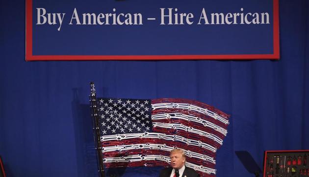 President Donald Trump speaks to workers at the headquarters of tool manufacturer Snap-On on April 18, 2017 in Kenosha, Wisconsin. During the visit, Trump signed an executive order to try to bring jobs back to American workers and revamp the H-1B visa guest worker program. (AFP File Photo) President Donald Trump speaks to workers at the headquarters of tool manufacturer Snap-On on April 18, 2017 in Kenosha, Wisconsin. During the visit, Trump signed an executive order to try to bring jobs back to American workers and revamp the H-1B visa guest worker program. (AFP File Photo)