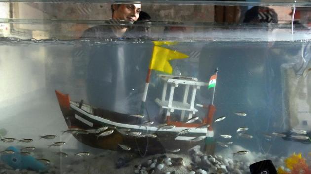 People attend the Urban Art Festival as part of the Sassoon Dock Art Project at Sassoon Dock in Mumbai.The exhibition is free to view and also features screenings, talks and tours. (Anshuman Poyrekar / HT Photo)