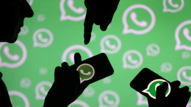 FILE PHOTO: Men pose with smartphones in front of displayed Whatsapp logo in this illustration September 14, 2017. (Reuters) FILE PHOTO: Men pose with smartphones in front of displayed Whatsapp logo in this illustration September 14, 2017. (Reuters)