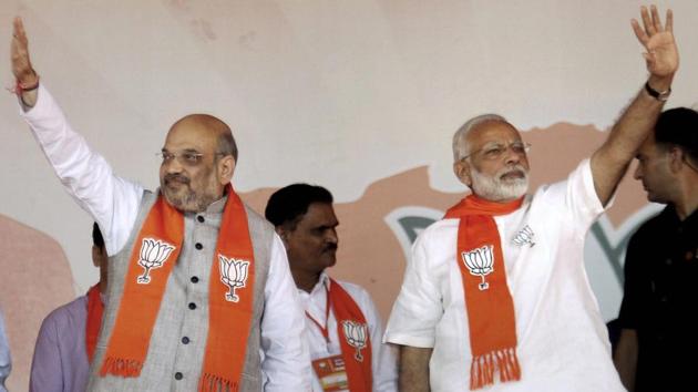 Prime Minister Narendra Modi with BJP President Amit Shah during the Gujarat Gaurav Mahasammelan in Ahmedabad on Monday. (PTI) Prime Minister Narendra Modi with BJP President Amit Shah during the Gujarat Gaurav Mahasammelan in Ahmedabad on Monday. (PTI)