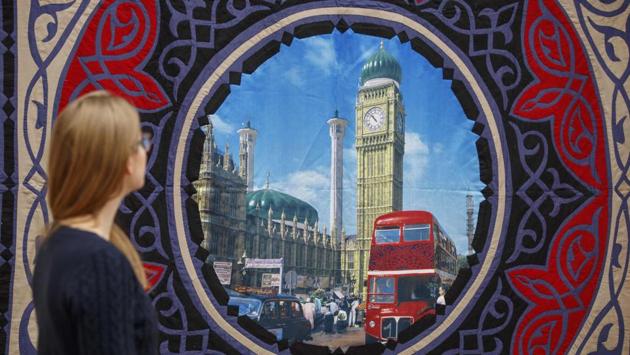 'Islamic Project' a piece by AES+F, a collective of four Russian artists, makes a statement on the Islamicisation of Britain. While some artists try to affect change from inside Russia, Guelman said many like him had been forced to leave. “It was impossible to do exhibitions,” (Tolga Akmen / AFP)