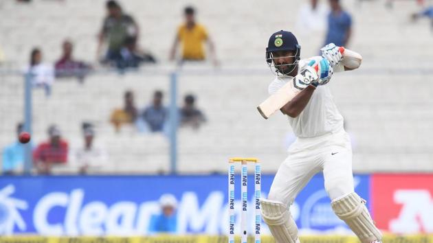 Pujara then batted sensibly and punished almost every loose delivery. (AFP) Pujara then batted sensibly and punished almost every loose delivery. (AFP)
