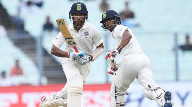 Cheteshwar Pujara (L) and Wriddhiman Saha were the two unbeaten batsmen for India vs Sri Lanka on the second day of the first Test in Kolkata on Friday. (AFP) Cheteshwar Pujara (L) and Wriddhiman Saha were the two unbeaten batsmen for India vs Sri Lanka on the second day of the first Test in Kolkata on Friday. (AFP)
