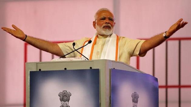 File photo of Prime Minister Narendra Modi addressing a gathering in Ahmedabad. The good news will help the ruling BJP-led government tackle the narrative around the economy, which is growing at its slowest in three years, as it heads into a series of elections over the coming months.(Reuters)