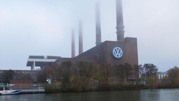A picture taken on November 17, 2017 shows the logo of German car maker Volkswagen on the facade of the main administrative building of the Volkswagen brand at VW plant in Wolfsburg, central Germany. (AFP) A picture taken on November 17, 2017 shows the logo of German car maker Volkswagen on the facade of the main administrative building of the Volkswagen brand at VW plant in Wolfsburg, central Germany. (AFP)