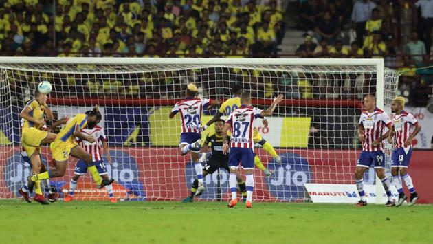 Kerala Blasters FC players try to score a goal during match 1 of the Indian Super League between Kerala Blasters FC and Atletico de Kolkata FC held at the Jawaharlal Nehru Stadium in Kochi.  (ISL / SPORTZPICS) 