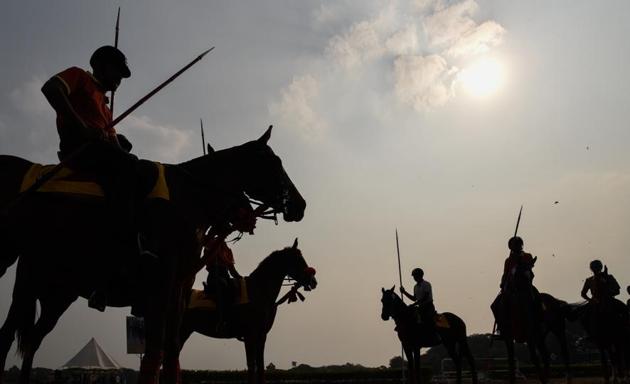 Horse riders practising tent pegging at the Southern Star Horse Show-2017 at Pune Race Course on Thursday. (Sanket Wankhade/HT PHOTO) 