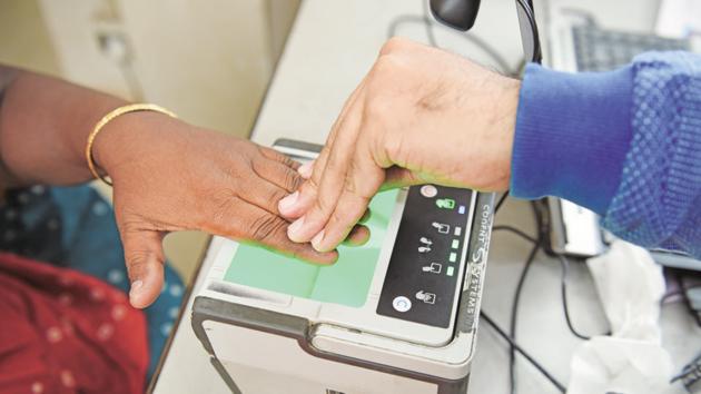 A woman submits her fingerprints at an Aadhaar registration centre in Kolkata. (Mint File Photo) A woman submits her fingerprints at an Aadhaar registration centre in Kolkata. (Mint File Photo)