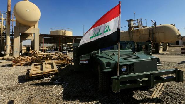 An Iraqi flag is seen on a military vehicle at an oil field in Dibis area on the outskirts of Kirkuk, Iraq October 17, 2017.(REUTERS File Photo)