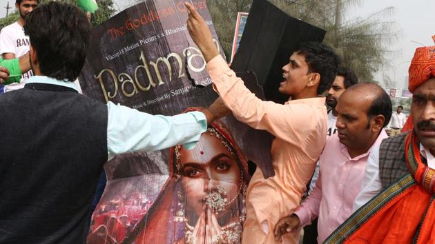 Members of the Rajput community stage a protest against the release of ‘Padmavati’ in Noida. Objections raised against the film include an alleged romance between Deepika Padukone’s Padmavati and Ranveer Singh’s Khilji, distortion of history in the film, and the ‘ghomaar’ song which portrays Padmavati as a ‘painted doll’among others. (Salman Ali / HT Photo) Members of the Rajput community stage a protest against the release of ‘Padmavati’ in Noida. Objections raised against the film include an alleged romance between Deepika Padukone’s Padmavati and Ranveer Singh’s Khilji, distortion of history in the film, and the ‘ghomaar’ song which portrays Padmavati as a ‘painted doll’among others. (Salman Ali / HT Photo)