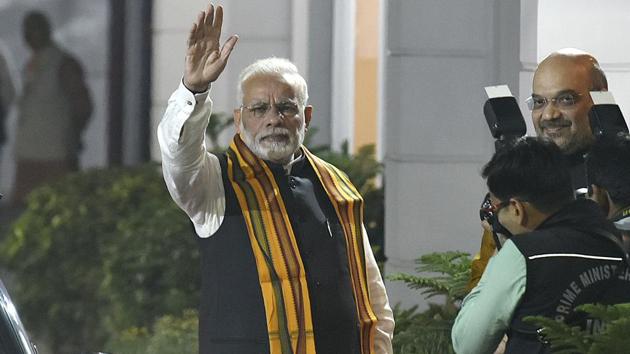 Prime Minister Narendra Modi and BJP chief Amit Shah outside the party headquarters in New Delhi where a meeting to decide the candidates for the Gujarat assembly elections was held.(Raj K Raj/HT)