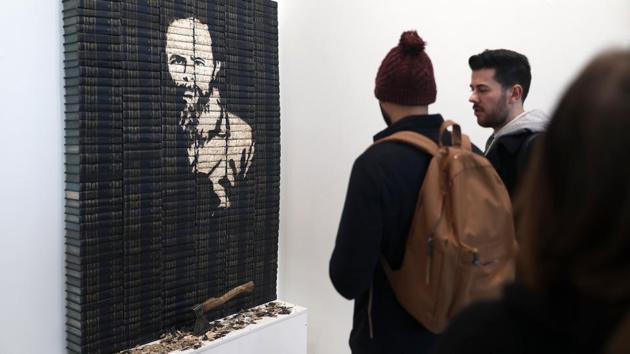 Such an exhibition would not be allowed in Russia, said Alyokhina, concurring while highlighting Siberian artist Vasily Slonov’s work -- a pile of Lenin-era books whose spines have been sculpted into a face. (Tim P. Whitby / Getty Images)