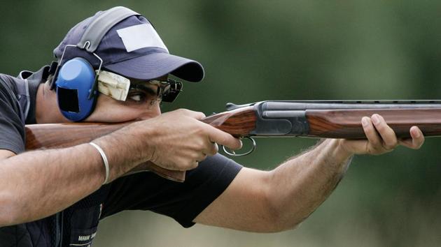 Manavjit Singh Sandhu of Punjab beat UP’s Anwer Sultan and Zoravar Singh Sandhu (bronze) to win gold in the men’s trap event at the National Shotgun Championship in New Delhi on Saturday. (Getty Images) Manavjit Singh Sandhu of Punjab beat UP’s Anwer Sultan and Zoravar Singh Sandhu (bronze) to win gold in the men’s trap event at the National Shotgun Championship in New Delhi on Saturday. (Getty Images)