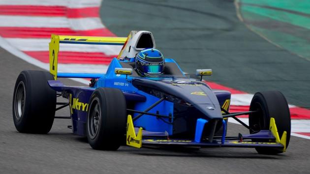 Anindith Reddy, the JK Euro 17 championship leader, in action during Day 1 of the final round of the JK Tyre-FMSCI National Racing Championship at Buddh International Circuit on Saturday.(HT Photo)