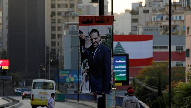 A poster depicting Saad al-Hariri, who announced his resignation as Lebanon's prime minister from Saudi Arabia, is seen in Beirut, Lebanon November 17, 2017.(REUTERS Photo)