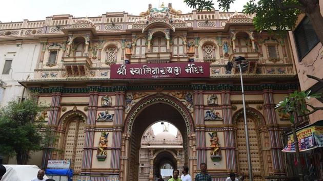 The entrance gate of the nearly 200 year old Swaminarayan Kalupur Temple in Ahmedabad. Conservation experts warn Ahmedabad, one of the world’s most polluted cities, faces a mammoth task defending its newly won UNESCO status --its 600-year-old enclave was named India’s first ‘World Heritage City’ in July- as its fragile cultural icons decay under neglect, traffic and trash. (Sam Panthaky / AFP) The entrance gate of the nearly 200 year old Swaminarayan Kalupur Temple in Ahmedabad. Conservation experts warn Ahmedabad, one of the world’s most polluted cities, faces a mammoth task defending its newly won UNESCO status --its 600-year-old enclave was named India’s first ‘World Heritage City’ in July- as its fragile cultural icons decay under neglect, traffic and trash. (Sam Panthaky / AFP)