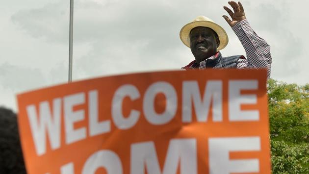 Kenya's opposition party, National Super Alliance (NASA) leader Raila Odinga waves during a demonstration in Nairobi. Police fired live rounds and tear gas to prevent Odinga’s convoy from making its way to Nairobi’s main park so that he could address supporters after returning from a trip overseas. Legislator Otiende Amollo said his car was shot at by police. (Simon Maina / AFP)