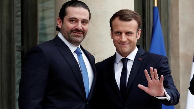 French President Emmanuel Macron and Saad al-Hariri, who announced his resignation as Lebanon's prime minister while on a visit to Saudi Arabia, react on the steps of the Elysee Palace in Paris, France, November 18, 2017. (REUTERS) French President Emmanuel Macron and Saad al-Hariri, who announced his resignation as Lebanon's prime minister while on a visit to Saudi Arabia, react on the steps of the Elysee Palace in Paris, France, November 18, 2017. (REUTERS)