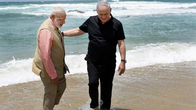 Prime Minister Narendra Modi with his Israeli counterpart Benjamin Netanyahu during a visit to the Olga Beach in Israel.(PTI File Photo)