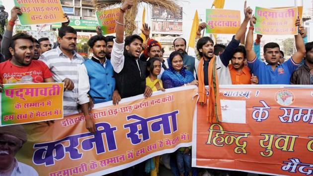Activists of Rashtriya Rajput Karni Sena (Jharkhand wing) hold placards demanding the ban on screening of upcoming Bollywood movie 'Padmavati', in Ranchi on Saturday. (PTI Photo) Activists of Rashtriya Rajput Karni Sena (Jharkhand wing) hold placards demanding the ban on screening of upcoming Bollywood movie 'Padmavati', in Ranchi on Saturday. (PTI Photo)