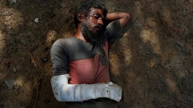 Imam Hossain, 42, who fled Myanmar following attacks on the community early August, sleeps on the ground at Kutupalang refugee camp, in Bangladesh. Bangladeshi hospitals and international aid agencies struggle to provide medical care for the refugees, many of whom have suffered horrific injuries and psychological trauma. (Jorge Silva / REUTERS) Imam Hossain, 42, who fled Myanmar following attacks on the community early August, sleeps on the ground at Kutupalang refugee camp, in Bangladesh. Bangladeshi hospitals and international aid agencies struggle to provide medical care for the refugees, many of whom have suffered horrific injuries and psychological trauma. (Jorge Silva / REUTERS)