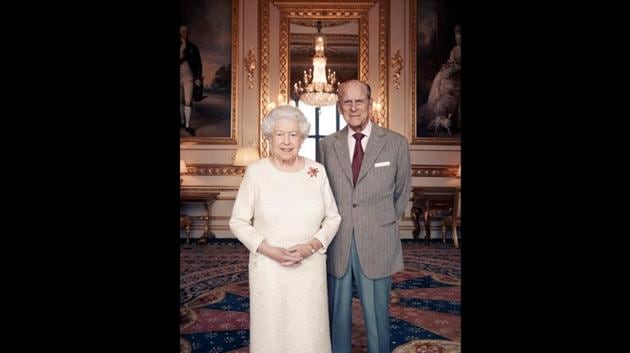 Britain’s Queen Elizabeth and Prince Philip pose for a photo in the White Drawing Room at Windsor Castle, England. Buckingham Palace issued a new photographic portrait of Queen Elizabeth and her husband Prince Philip on Saturday to mark their 70th wedding anniversary. The release of the new portrait was accompanied by the issue of a new set of six postage stamps by Royal Mail to mark the milestone. (Matt Holyoak / Camera Press via AP) Britain’s Queen Elizabeth and Prince Philip pose for a photo in the White Drawing Room at Windsor Castle, England. Buckingham Palace issued a new photographic portrait of Queen Elizabeth and her husband Prince Philip on Saturday to mark their 70th wedding anniversary. The release of the new portrait was accompanied by the issue of a new set of six postage stamps by Royal Mail to mark the milestone. (Matt Holyoak / Camera Press via AP)