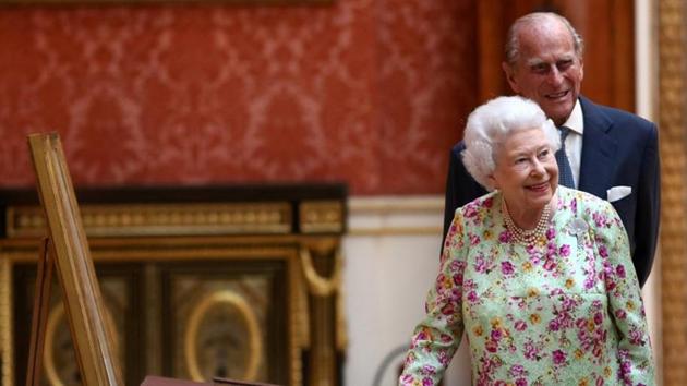Britain's Queen Elizabeth II and Prince Philip, Duke of Edinburgh stand next to a display of Spanish items from the Royal Collection at Buckingham Palace, London, Britain on July 12. (REUTERS) Britain's Queen Elizabeth II and Prince Philip, Duke of Edinburgh stand next to a display of Spanish items from the Royal Collection at Buckingham Palace, London, Britain on July 12. (REUTERS)