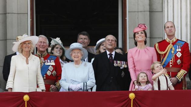 Members of Britain's Royal family from left, Camilla, the Duchess of Cornwall, Prince Charles, Princess Eugenie, Queen Elizabeth II, background Timothy Laurence, Princess Beatrice, Prince Philip, Kate, the Duchess of Cambridge, Princess Charlotte, Prince George and Prince William watch a fly past from a balcony of Buckingham Palace, after attending the annual Trooping the Colour Ceremony in London. (Kirsty Wigglesworth / AP) Members of Britain's Royal family from left, Camilla, the Duchess of Cornwall, Prince Charles, Princess Eugenie, Queen Elizabeth II, background Timothy Laurence, Princess Beatrice, Prince Philip, Kate, the Duchess of Cambridge, Princess Charlotte, Prince George and Prince William watch a fly past from a balcony of Buckingham Palace, after attending the annual Trooping the Colour Ceremony in London. (Kirsty Wigglesworth / AP)