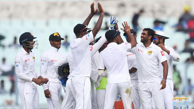 SDilruwan Perera's (2R) celebrates the wicket of India's Ravindra Jadeja during the third day of the first Test between India and Sri Lanka. (AFP) SDilruwan Perera's (2R) celebrates the wicket of India's Ravindra Jadeja during the third day of the first Test between India and Sri Lanka. (AFP)