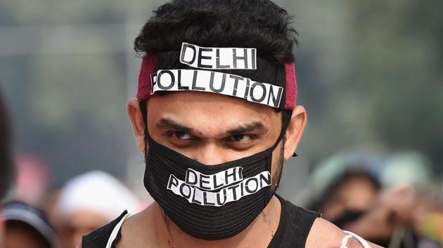 A participant wears a face mask with ‘Delhi pollution’ written across it to highlight the poor air quality during the Airtel Delhi Half Marathon 2017 in New Delhi on Sunday. (PTI Photo) A participant wears a face mask with ‘Delhi pollution’ written across it to highlight the poor air quality during the Airtel Delhi Half Marathon 2017 in New Delhi on Sunday. (PTI Photo)
