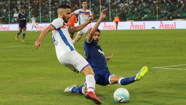 Telechea of FC Goa is tackled by Henrique Sereno of Chennaiyin FC. (ISL / SPORTZPICS) Telechea of FC Goa is tackled by Henrique Sereno of Chennaiyin FC. (ISL / SPORTZPICS)