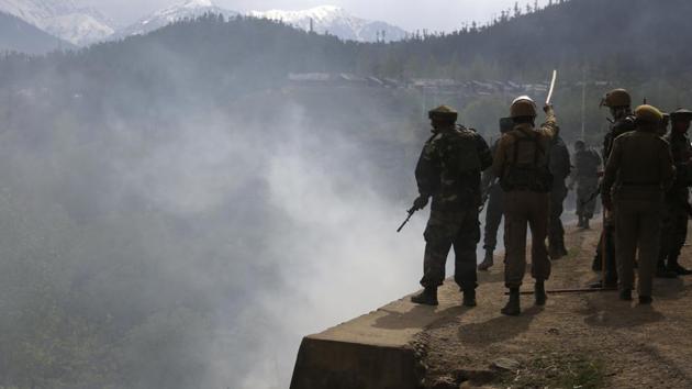 Soldiers take positions in the midst of a clash in Kashmir recently. (AP File) Soldiers take positions in the midst of a clash in Kashmir recently. (AP File)