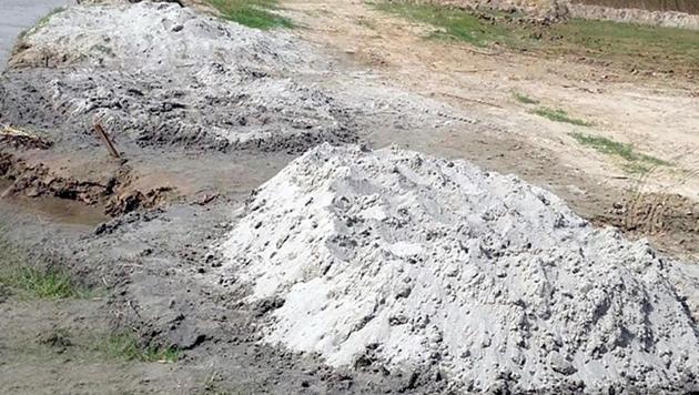 Sand excavated from Beas river near Goindwal Sahib in Tarn Taran on Saturday.(HT Photo)