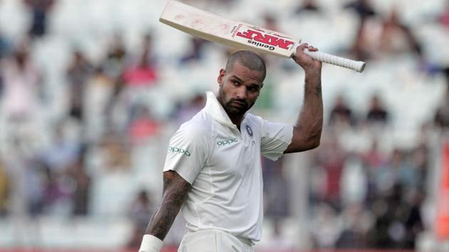 Shikhar Dhawan acknowledges the crowd after his dismissal during fourth day of the first India vs Sri Lanka Test in Kolkata.(AP)