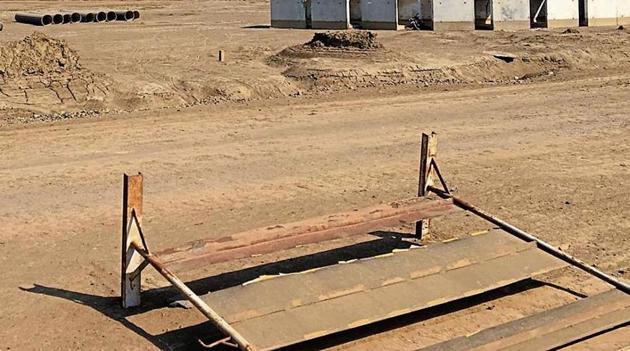Construction work for basic infrastructure proceeds in the activation zone in Dholera. This is supposed to be completed by 2019. (HT Photo) Construction work for basic infrastructure proceeds in the activation zone in Dholera. This is supposed to be completed by 2019. (HT Photo)