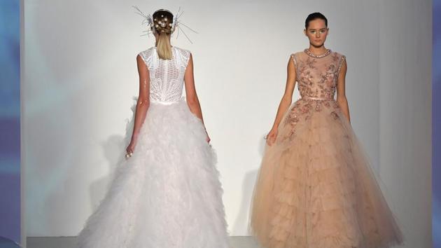 Models present creations by Amato during the Arab Fashion Week in the United Arab Emirate of Dubai. (AFP) Models present creations by Amato during the Arab Fashion Week in the United Arab Emirate of Dubai. (AFP)