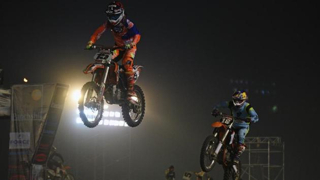 Riders during the Pune International Supercross League 2017 at Koregaon Park in Pune, on Sunday. Seven teams, 11 international, and 53 Indian riders took part in the fourth edition of the event. (Pratham Gokhale/HT Photo) Riders during the Pune International Supercross League 2017 at Koregaon Park in Pune, on Sunday. Seven teams, 11 international, and 53 Indian riders took part in the fourth edition of the event. (Pratham Gokhale/HT Photo)