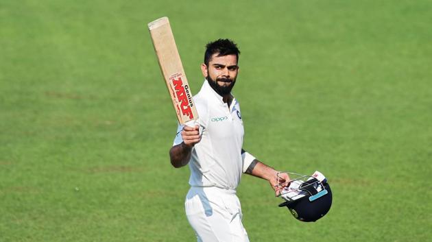 Indian cricket team captain Virat Kohli celebrates after scoring a century during the final day of the first Test between India and Sri Lanka at the Eden Gardens stadium in Kolkata. (AFP) Indian cricket team captain Virat Kohli celebrates after scoring a century during the final day of the first Test between India and Sri Lanka at the Eden Gardens stadium in Kolkata. (AFP)