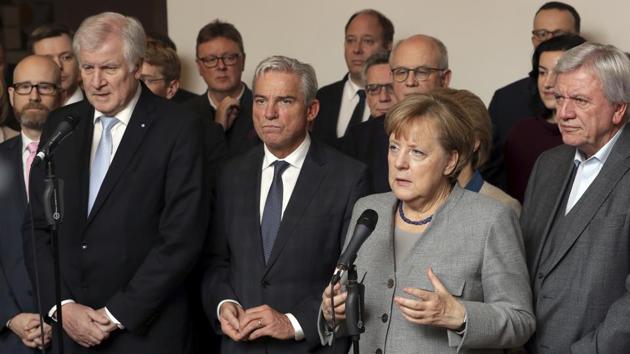 German Chancellor and chairwomen of the German Christian Democratic Union Angela Merkel addresses the media on the results of their exploratory talks on a coalition of the German Liberals, the Green Party, the Christian Democrats and the Christian Social Union, in Berlin on Monday. (AP) German Chancellor and chairwomen of the German Christian Democratic Union Angela Merkel addresses the media on the results of their exploratory talks on a coalition of the German Liberals, the Green Party, the Christian Democrats and the Christian Social Union, in Berlin on Monday. (AP)