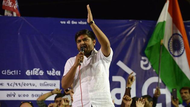 Hardik Patel (C), leader of Patidar Anamat Andolan Samiti (PAAS), addresses a gathering with his supporters during 'Adhikar Sammelan' at Mansa, some 50 km from Ahmedabad.(AFP File Photo)